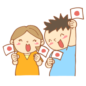 日本の国旗を持っている２人